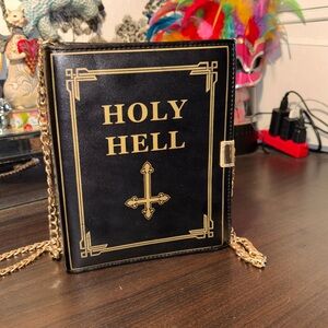 EUC Bad Religion" Holy Hell Crossbody Bag from Dolls Kill, specifically under th